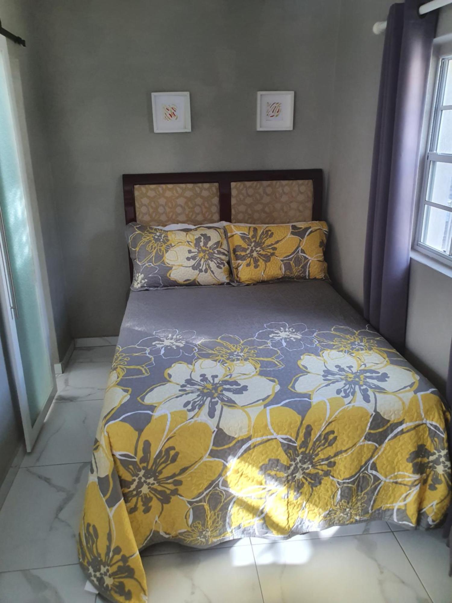 Devachan Apartments بريدج تاون الغرفة الصورة